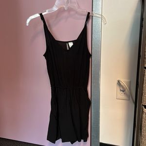 Black romper with pockets (unworn, new with tags)